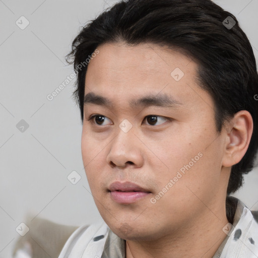 Neutral white young-adult male with short  black hair and brown eyes