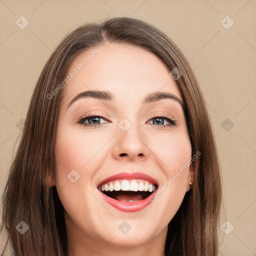 Joyful white young-adult female with long  brown hair and brown eyes