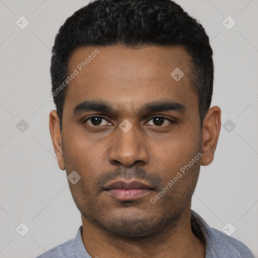 Neutral latino young-adult male with short  black hair and brown eyes
