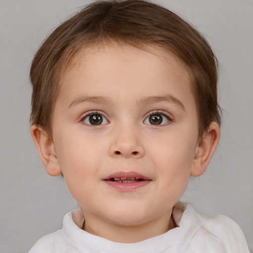 Joyful white child female with short  brown hair and brown eyes