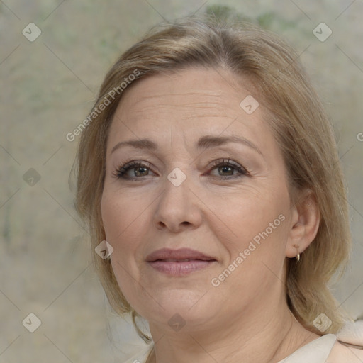 Joyful white adult female with medium  brown hair and brown eyes