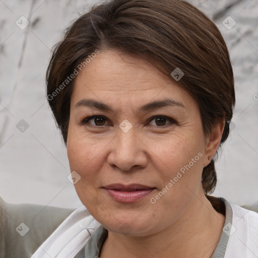 Joyful white adult female with short  brown hair and brown eyes