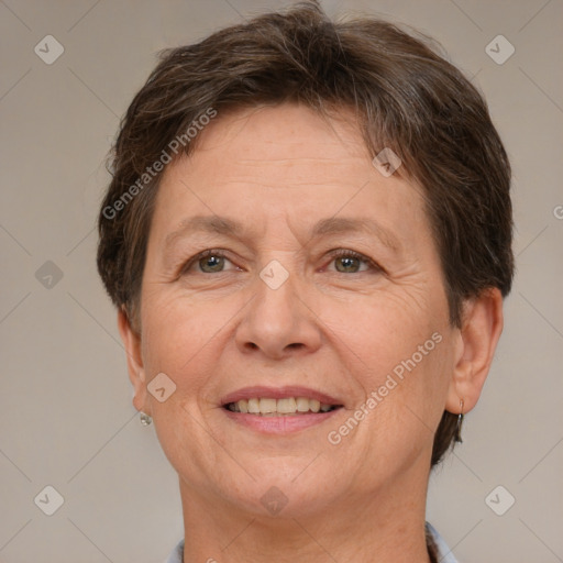 Joyful white adult female with short  brown hair and brown eyes