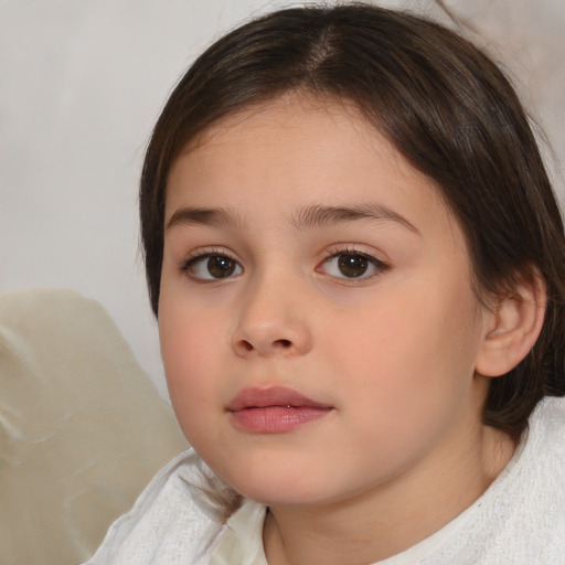 Neutral white child female with medium  brown hair and brown eyes