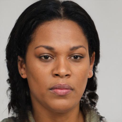 Neutral latino young-adult female with long  brown hair and brown eyes