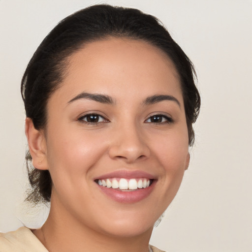 Joyful white young-adult female with medium  brown hair and brown eyes