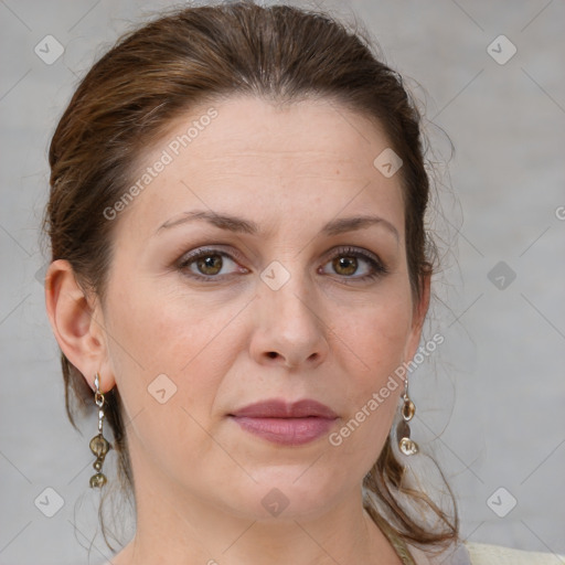 Joyful white adult female with medium  brown hair and grey eyes