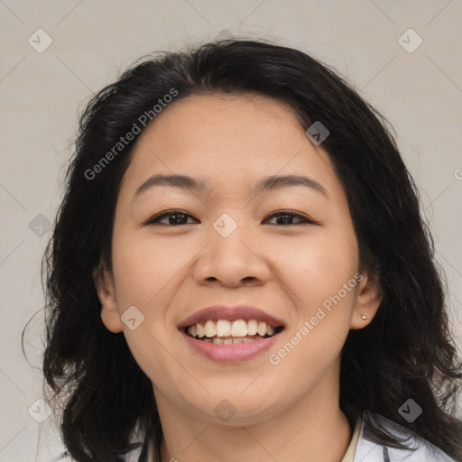 Joyful asian young-adult female with medium  black hair and brown eyes