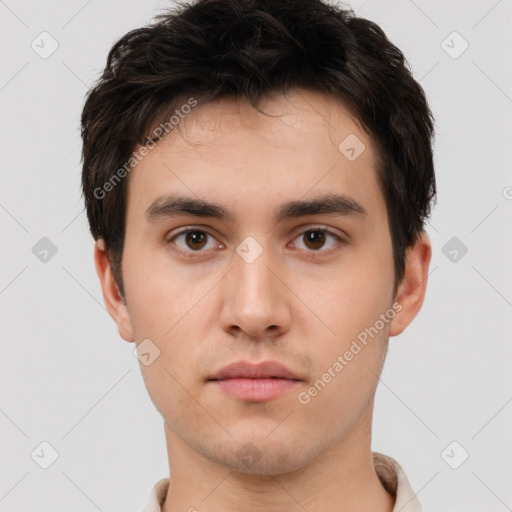 Neutral white young-adult male with short  brown hair and brown eyes