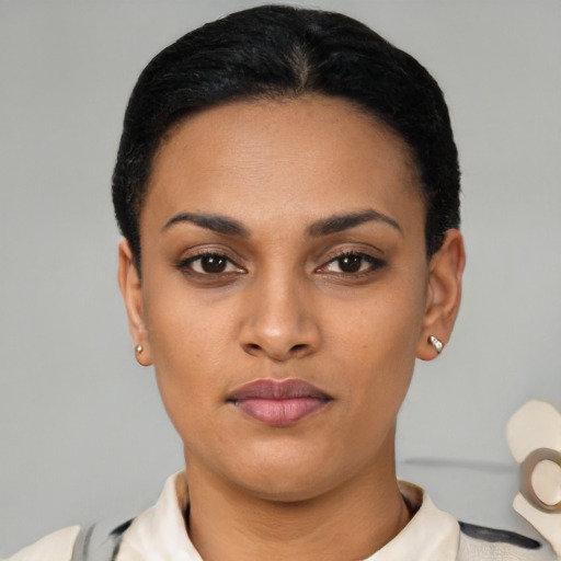 Neutral latino young-adult female with short  black hair and brown eyes