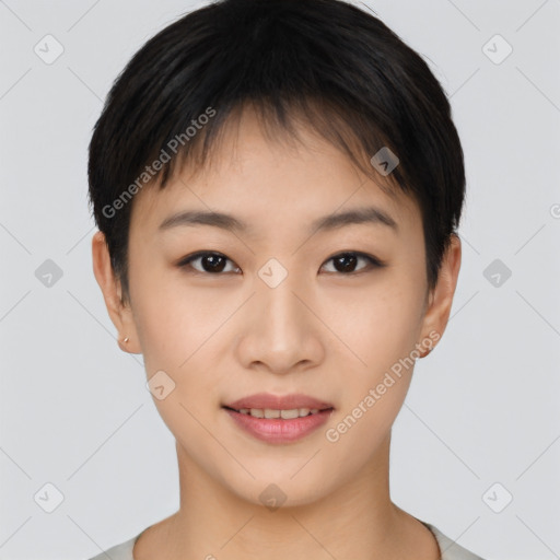 Joyful asian young-adult female with short  brown hair and brown eyes