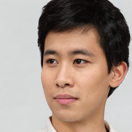 Neutral asian young-adult male with short  black hair and brown eyes