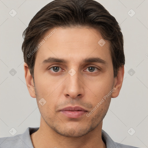 Neutral white young-adult male with short  brown hair and brown eyes