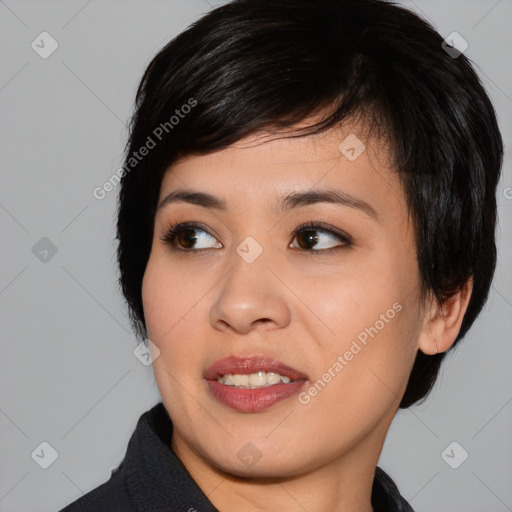 Joyful asian young-adult female with medium  black hair and brown eyes