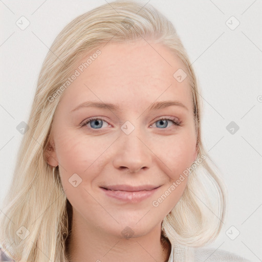 Joyful white young-adult female with long  brown hair and blue eyes