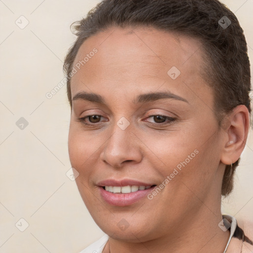 Joyful white young-adult female with short  brown hair and brown eyes