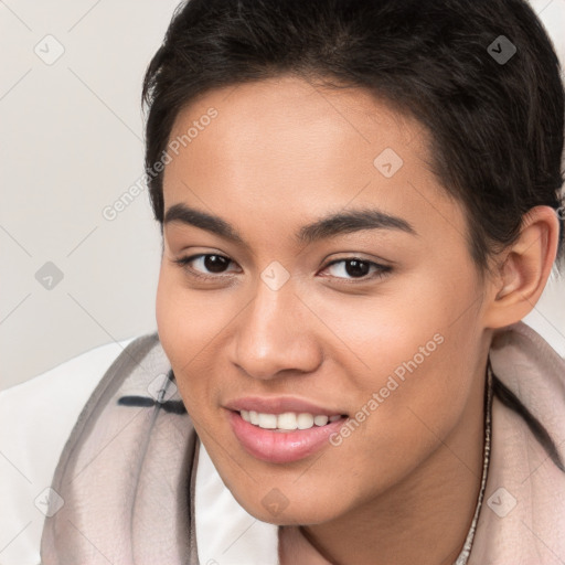 Joyful white young-adult female with short  brown hair and brown eyes