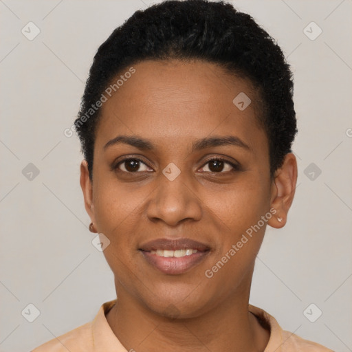 Joyful black young-adult female with short  brown hair and brown eyes