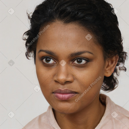 Joyful black young-adult female with medium  black hair and brown eyes