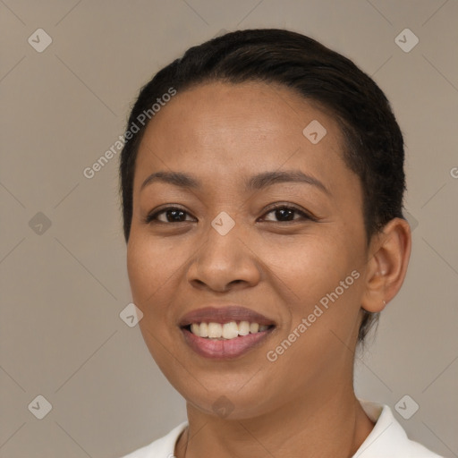 Joyful latino young-adult female with short  brown hair and brown eyes