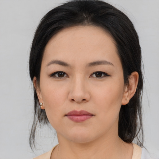 Neutral asian young-adult female with medium  black hair and brown eyes