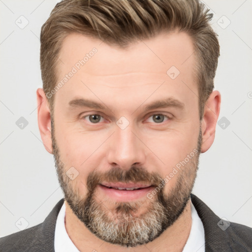 Joyful white adult male with short  brown hair and grey eyes