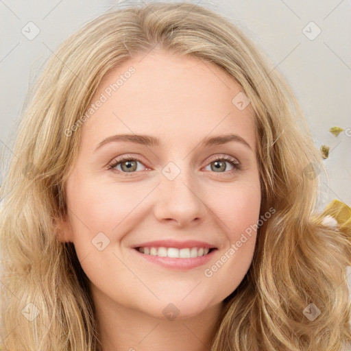 Joyful white young-adult female with long  brown hair and blue eyes