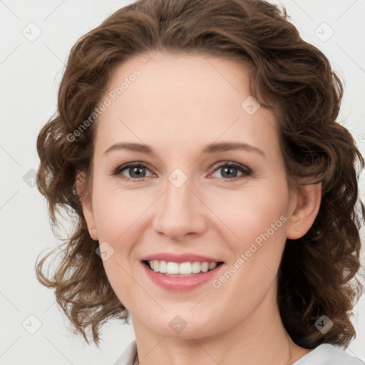 Joyful white young-adult female with medium  brown hair and green eyes