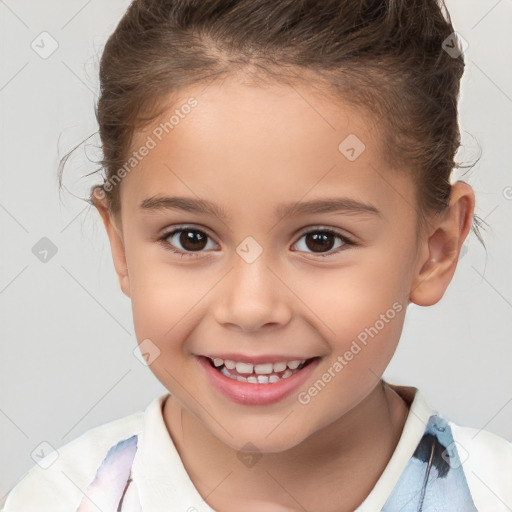 Joyful white child female with short  brown hair and brown eyes