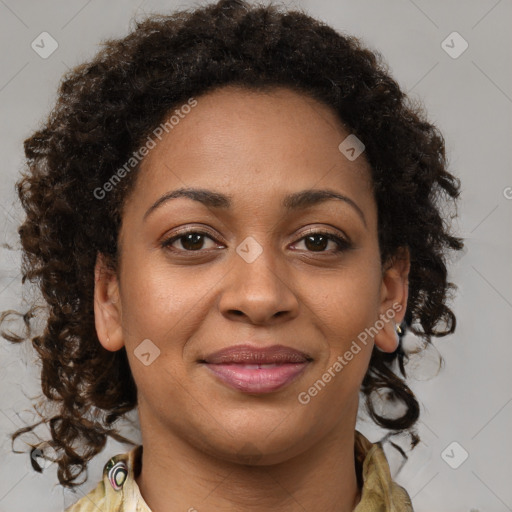 Joyful black young-adult female with medium  brown hair and brown eyes