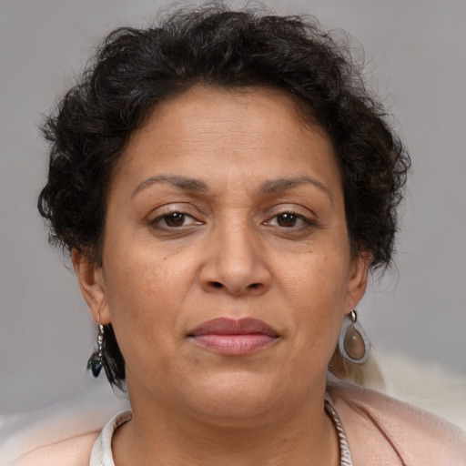 Joyful white adult female with short  brown hair and brown eyes