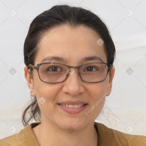 Joyful white adult female with short  brown hair and brown eyes