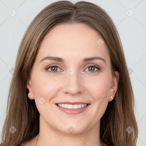 Joyful white young-adult female with long  brown hair and grey eyes