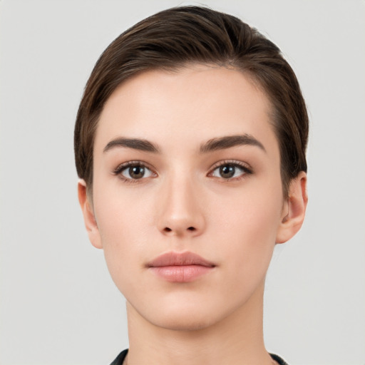 Neutral white young-adult female with short  brown hair and brown eyes