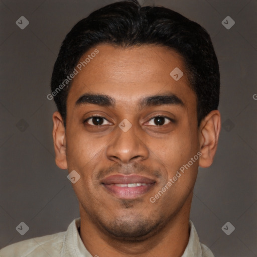Joyful latino young-adult male with short  black hair and brown eyes