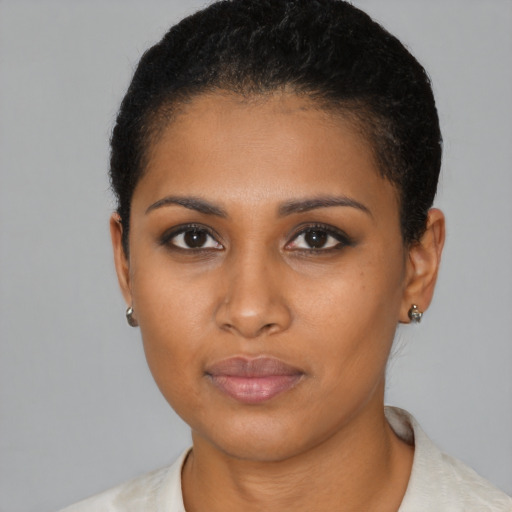 Neutral black young-adult female with short  black hair and brown eyes