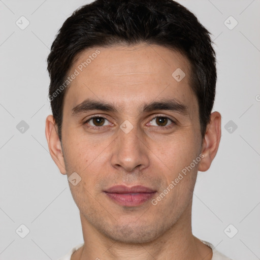 Joyful white young-adult male with short  brown hair and brown eyes