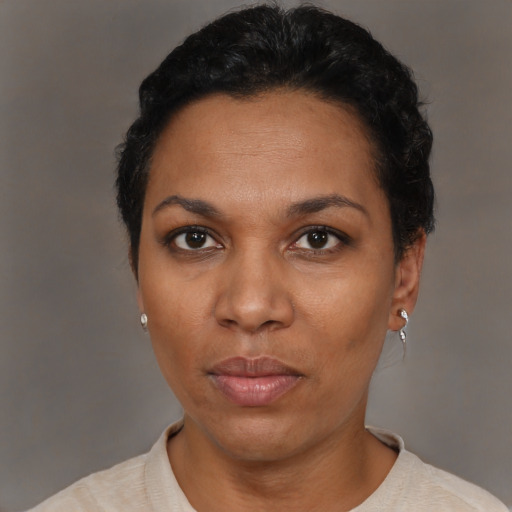 Neutral black adult female with short  black hair and brown eyes