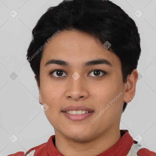 Joyful latino young-adult female with short  brown hair and brown eyes