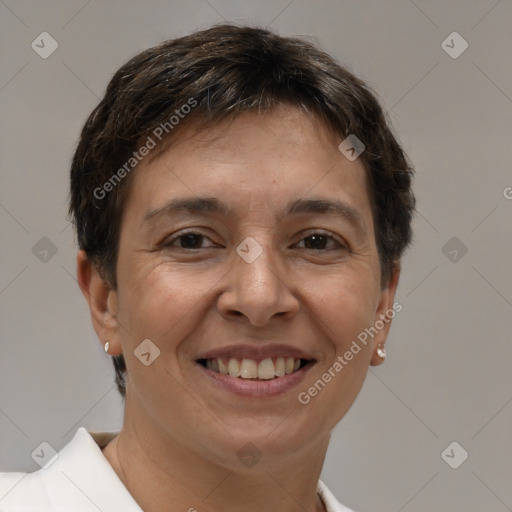 Joyful white adult female with short  brown hair and brown eyes