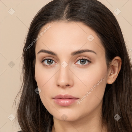 Neutral white young-adult female with long  brown hair and brown eyes