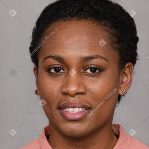 Joyful black young-adult female with short  brown hair and brown eyes