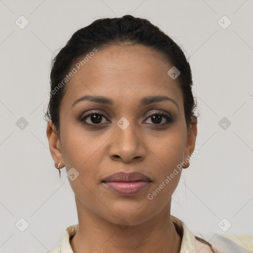 Joyful latino young-adult female with short  brown hair and brown eyes