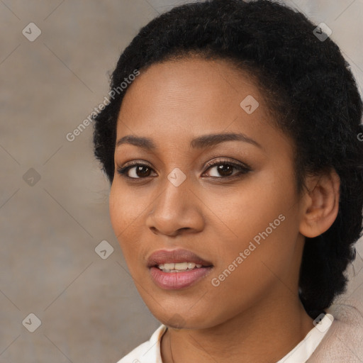 Joyful black young-adult female with medium  black hair and brown eyes