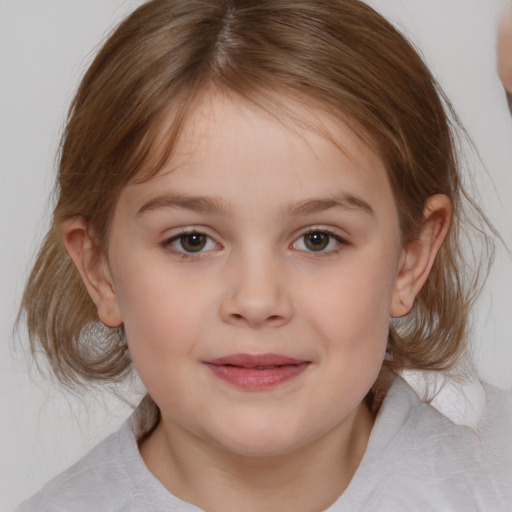 Joyful white child female with medium  brown hair and grey eyes