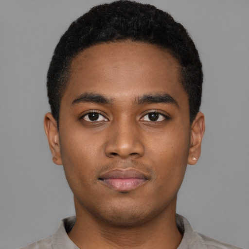 Neutral black young-adult male with short  black hair and brown eyes