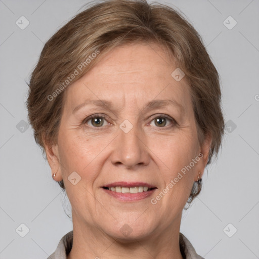 Joyful white adult female with short  brown hair and grey eyes