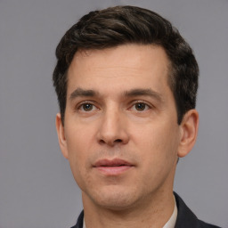 Neutral white adult male with short  brown hair and brown eyes