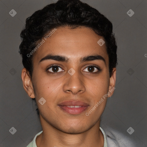 Joyful latino young-adult male with short  brown hair and brown eyes