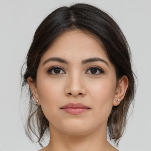 Neutral asian young-adult female with medium  brown hair and brown eyes